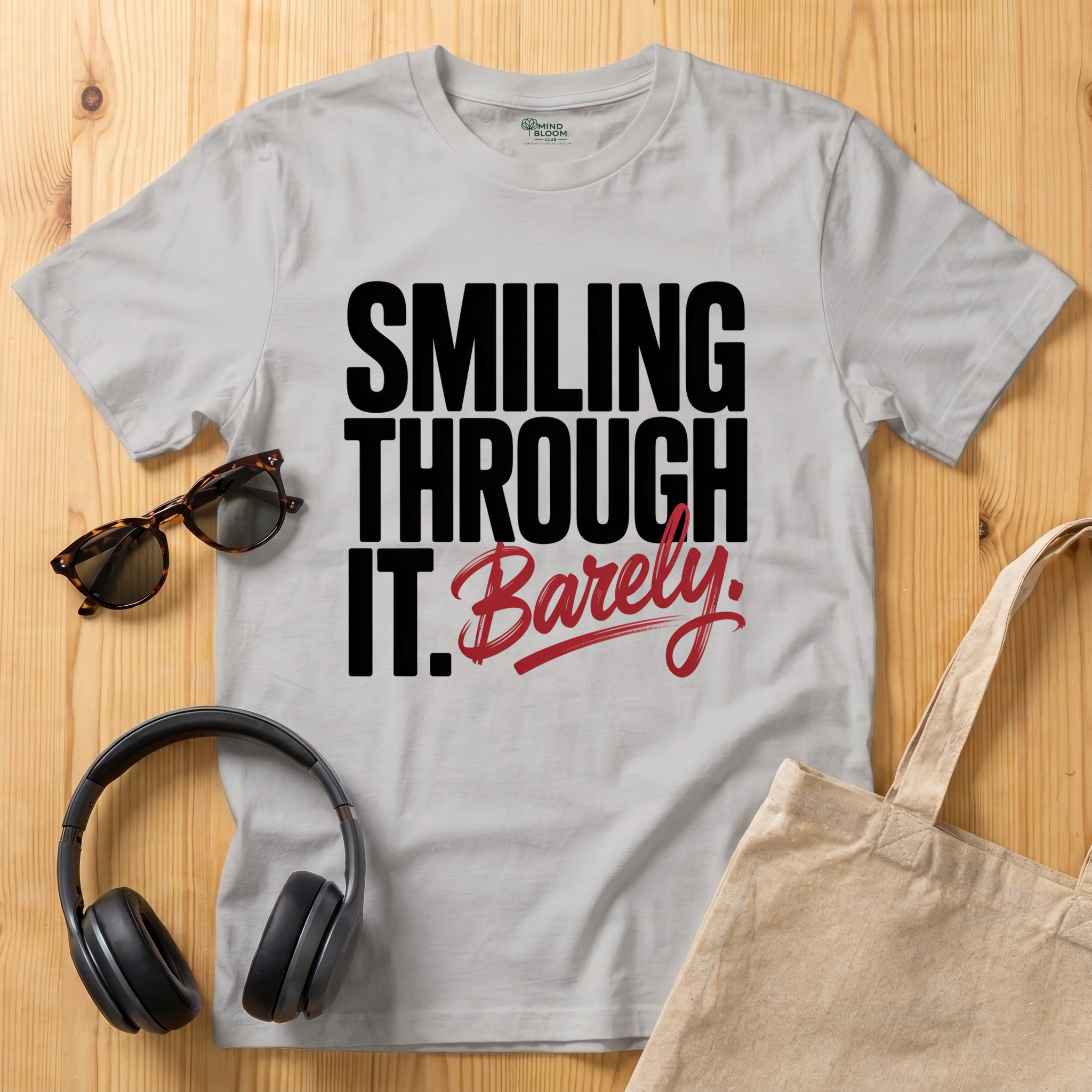 Smiling through it. Barely T-Shirt