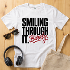 Smiling through it. Barely T-Shirt